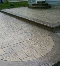Tuscany stone stamped concrete patio